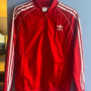 A red adidas jacket